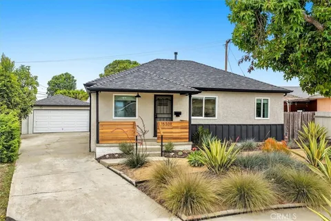 a view of a house with swimming pool
