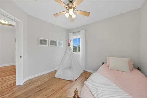a view of workspace with wooden floor