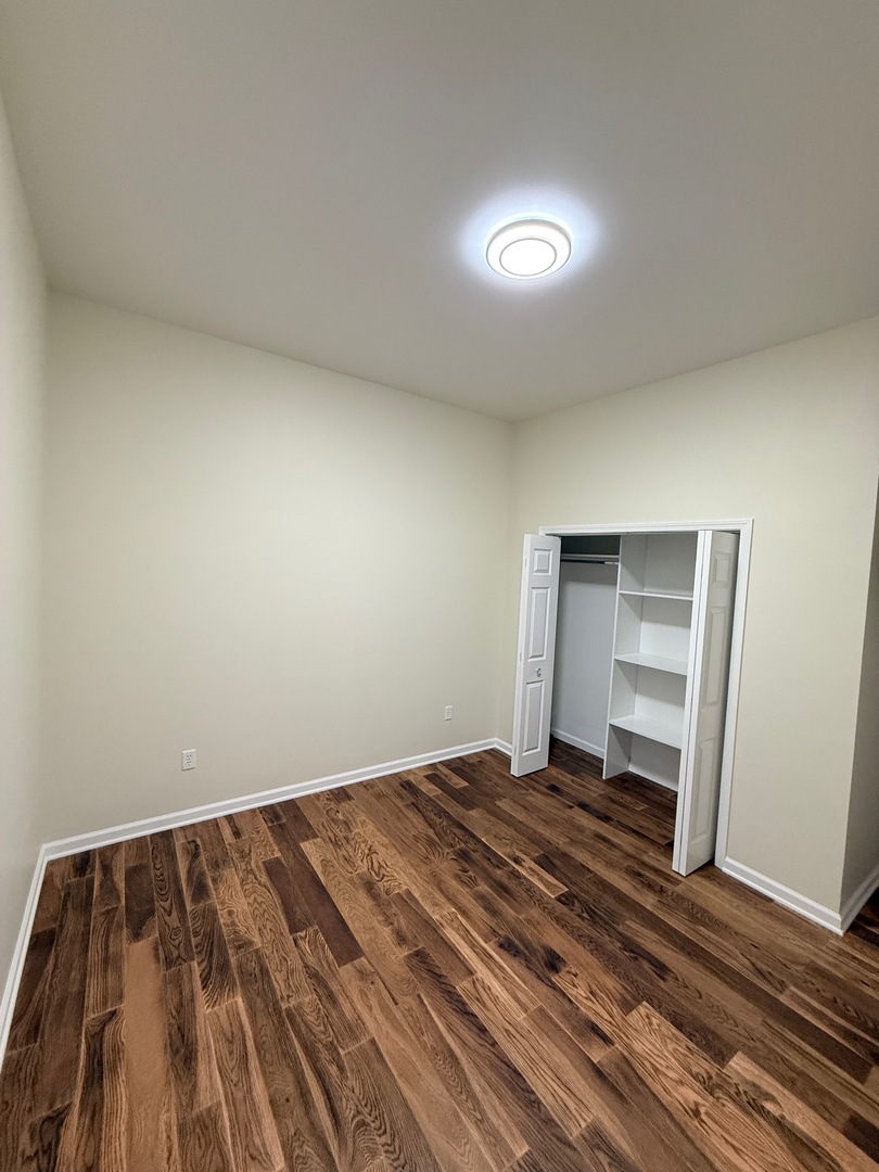 692 Penrose Road Dixon, IL 61021 - Photo 16 of 25 a view of wooden floor in an empty room