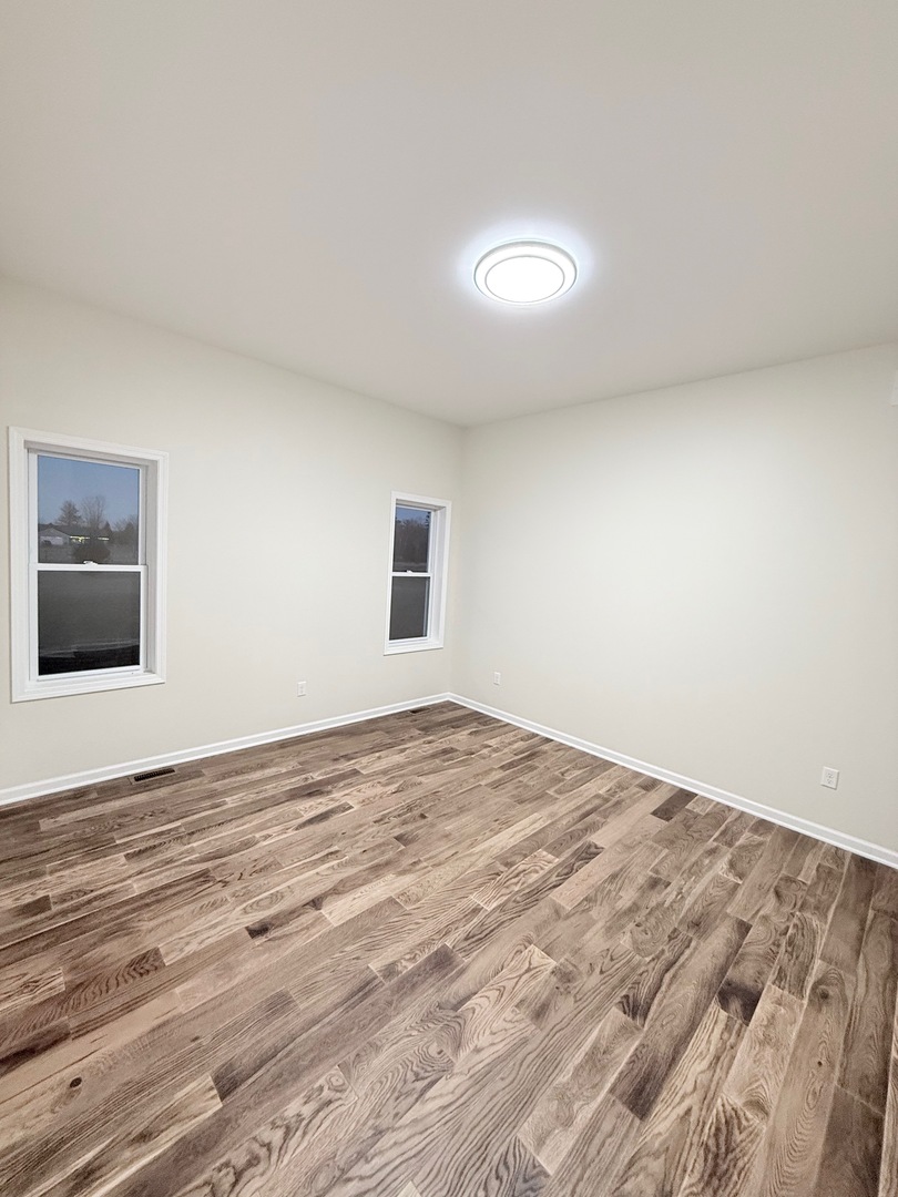 692 Penrose Road Dixon, IL 61021 - Photo 7 of 25 a view of an empty room and window