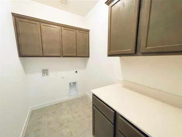a utility room with a sink