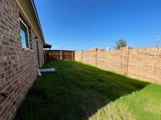 a view of an outdoor space and a yard