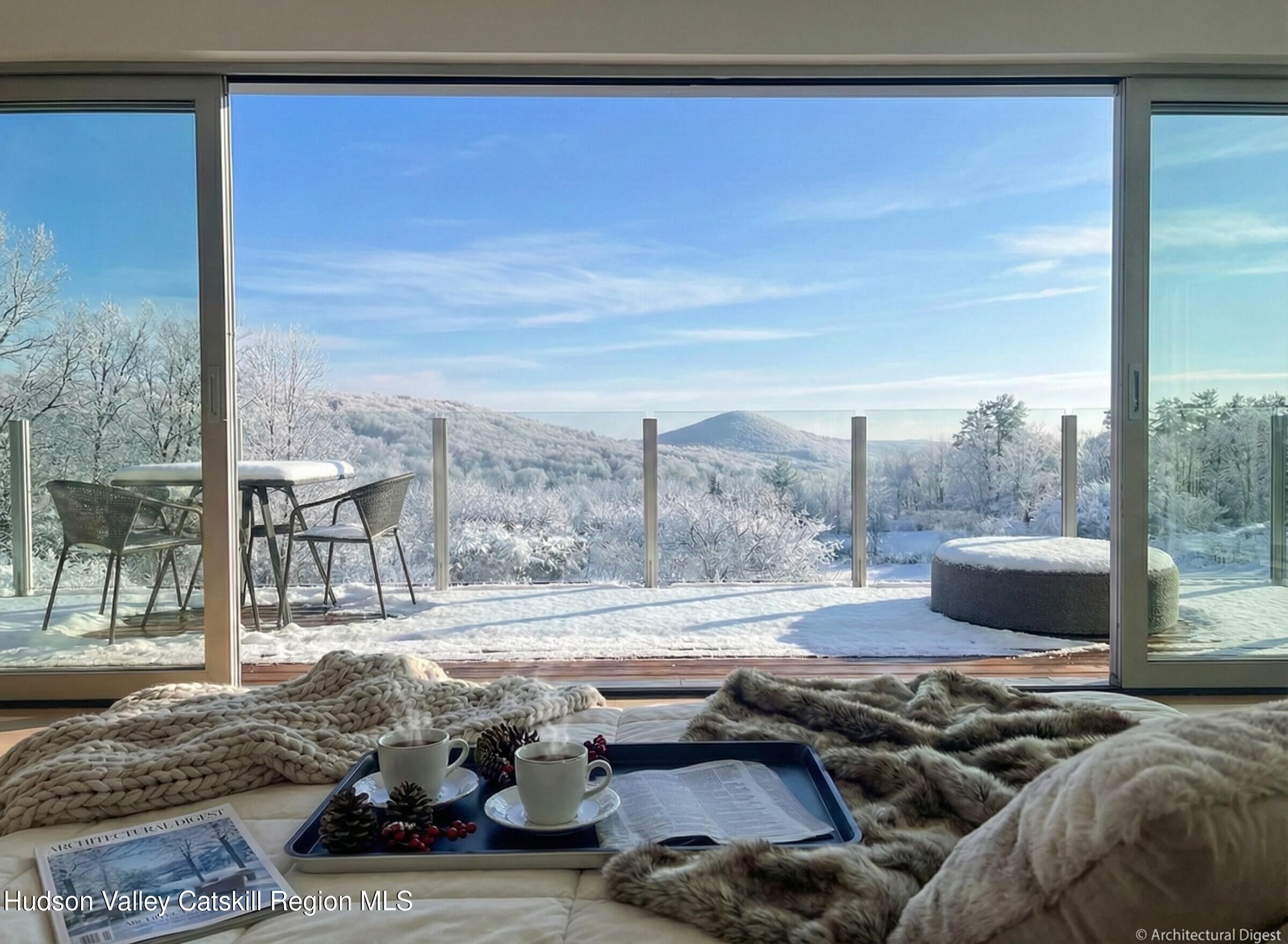 33 Ford Road Old Chatham, NY 12136 - Photo 27 of 38 a living room with furniture and a floor to ceiling window