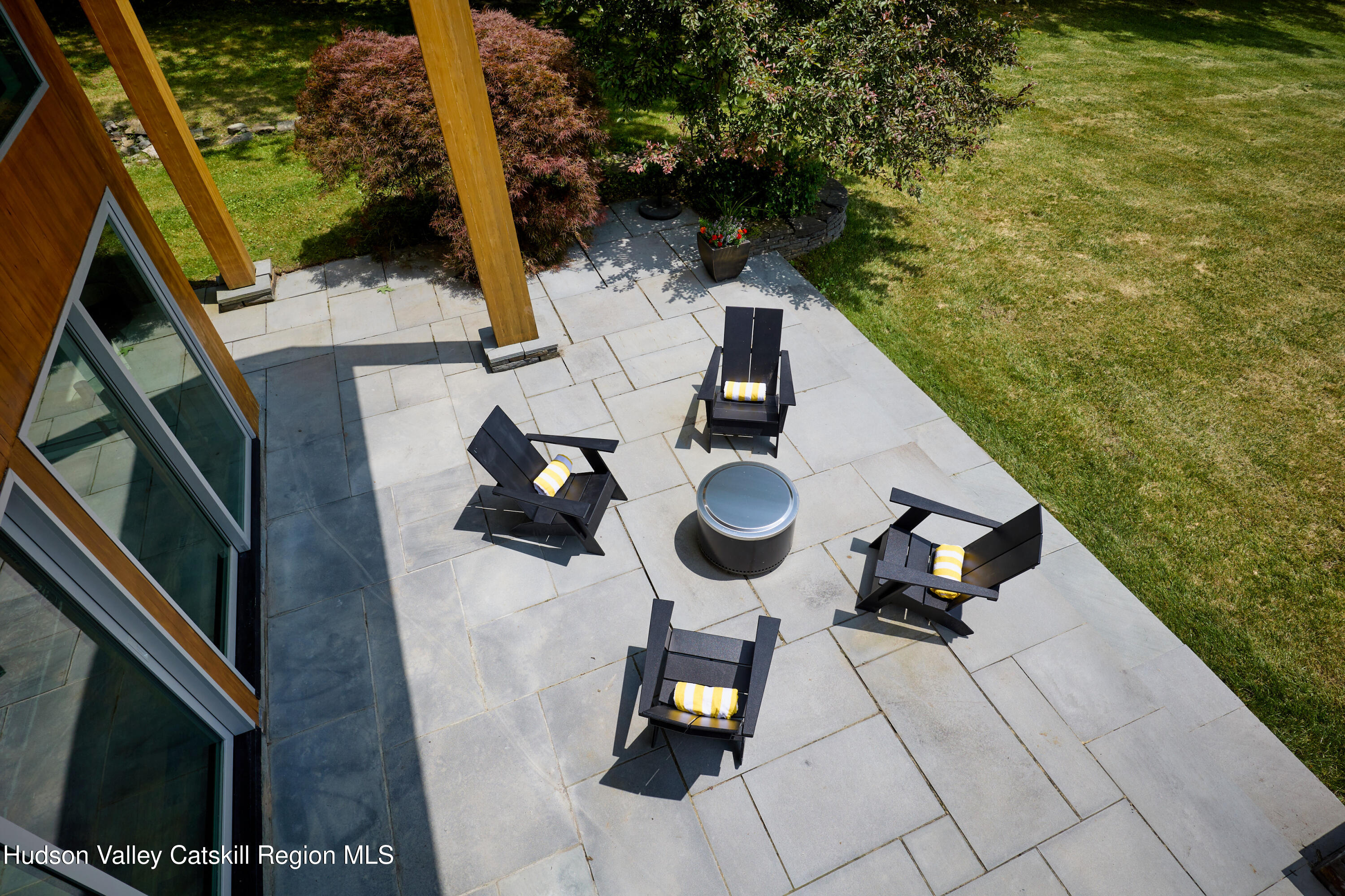 33 Ford Road Old Chatham, NY 12136 - Photo 33 of 38 a backyard of a house with seating space