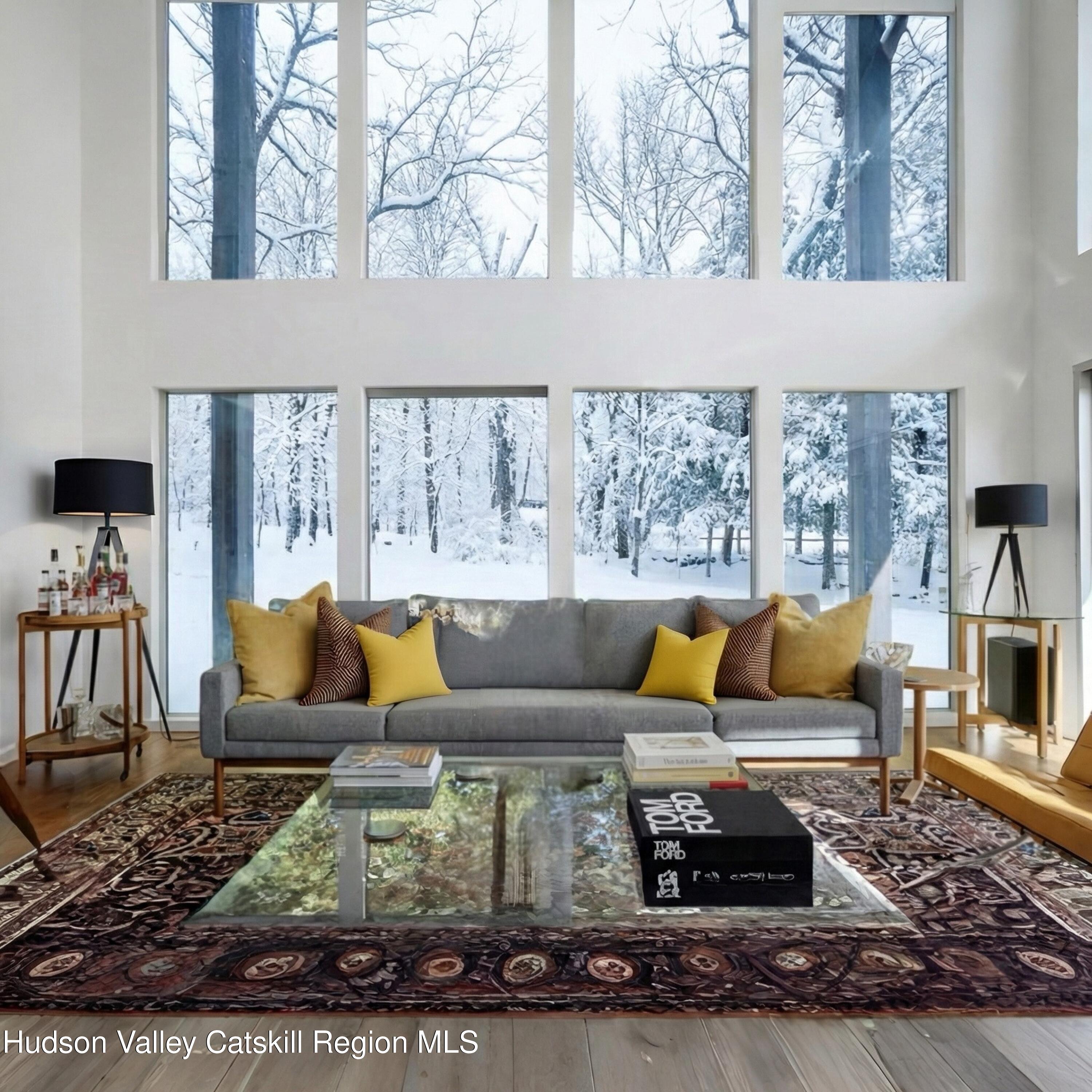 33 Ford Road Old Chatham, NY 12136 - Photo 7 of 38 a living room with furniture and a rug