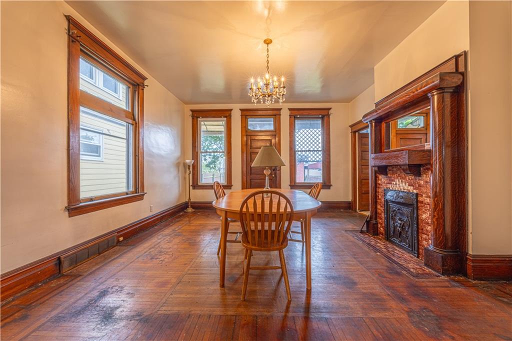 114 Union Street Uniontown, PA 15401 - Photo 19 of 28 a view of a livingroom with furniture window and wooden floor