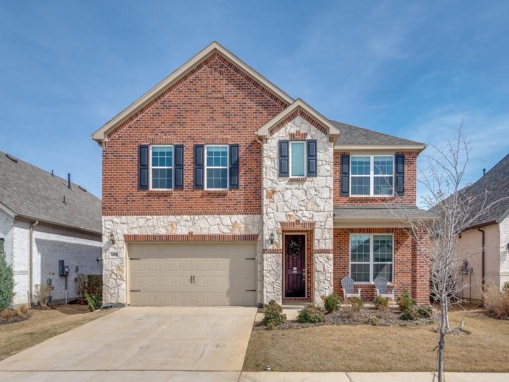 4408 Minnow Cove Oak Point, TX 75068 - Photo 2 of 31 a front view of a house with yard