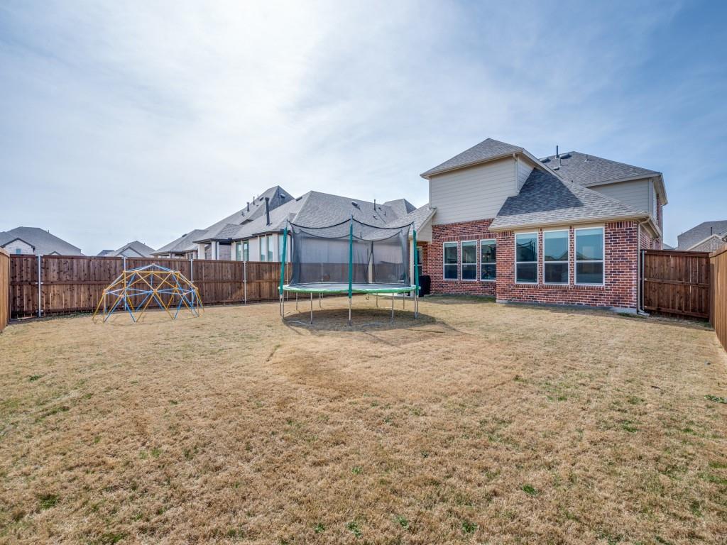 4408 Minnow Cove Oak Point, TX 75068 - Photo 24 of 31 a view of a house with a yard and balcony