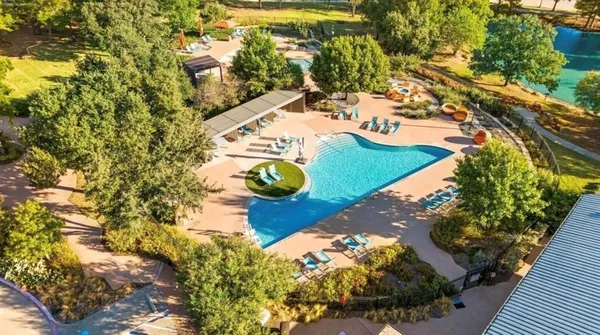 a view of a yard with an outdoor space