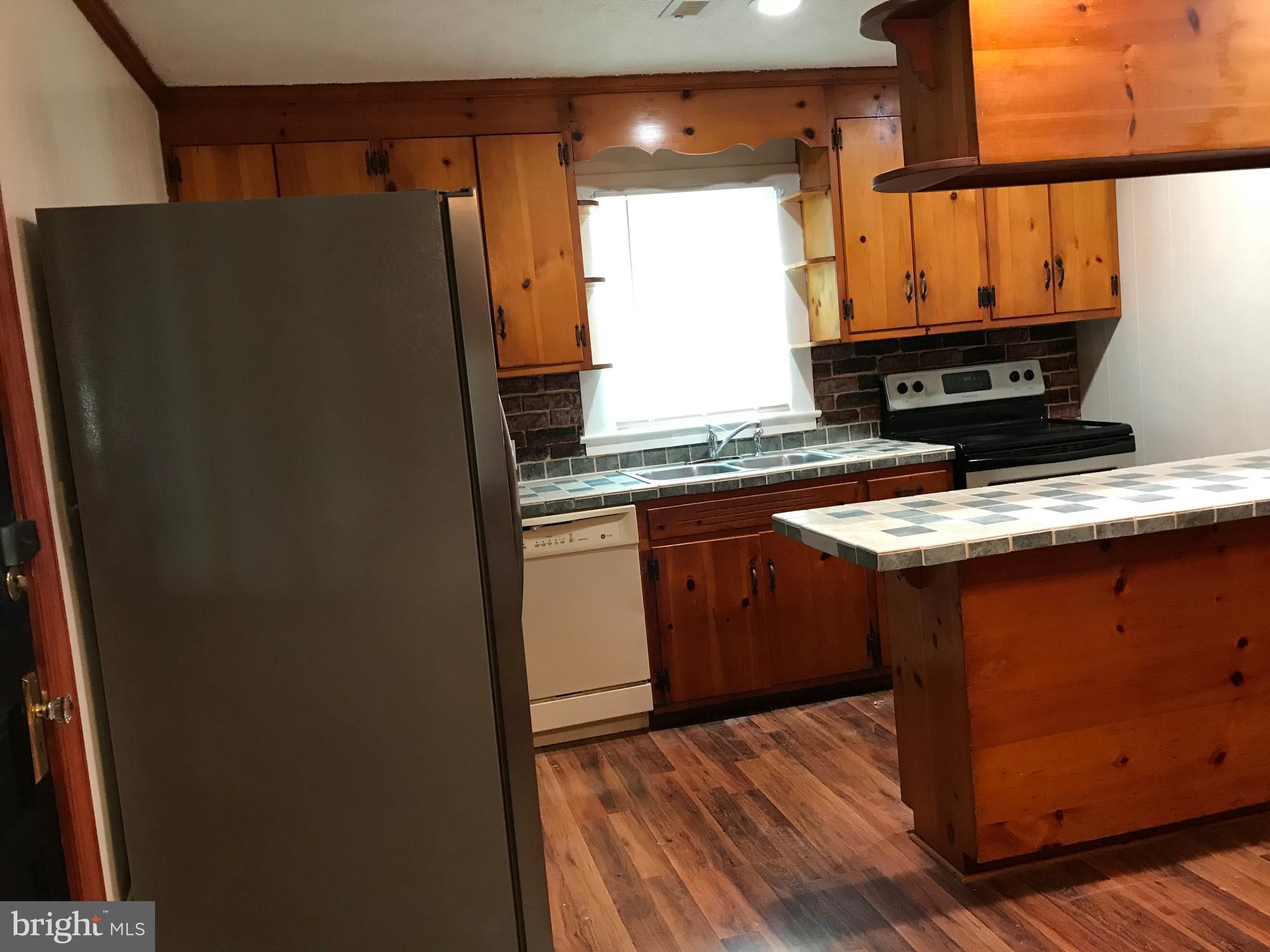 7133 Burr Hill Road Rhoadesville, VA 22542 - Photo 2 of 14 KItchen