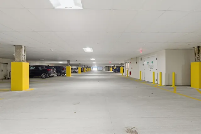 a view of a house with pool and chairs