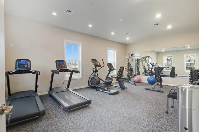 a street view with a building in the background