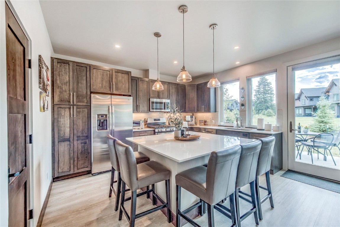 567 Fly Line Drive Silverthorne, CO 80498 - Photo 9 of 37 a dining room filled with furniture and window