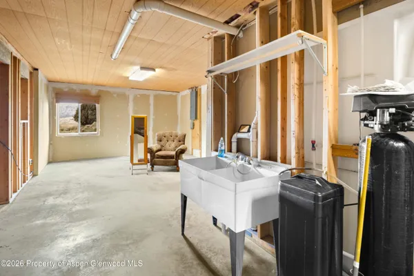a view of a livingroom with furniture and window