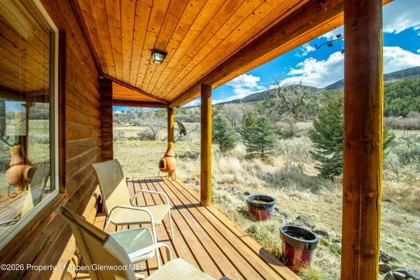 a view of outdoor space with seating area