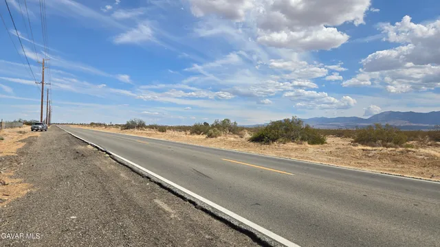 a view of a city street from a building
