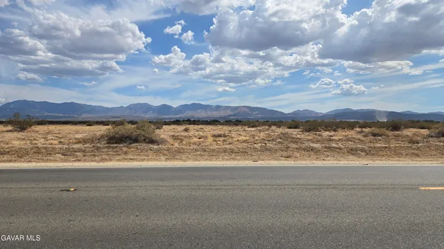 a view of mountain with lake