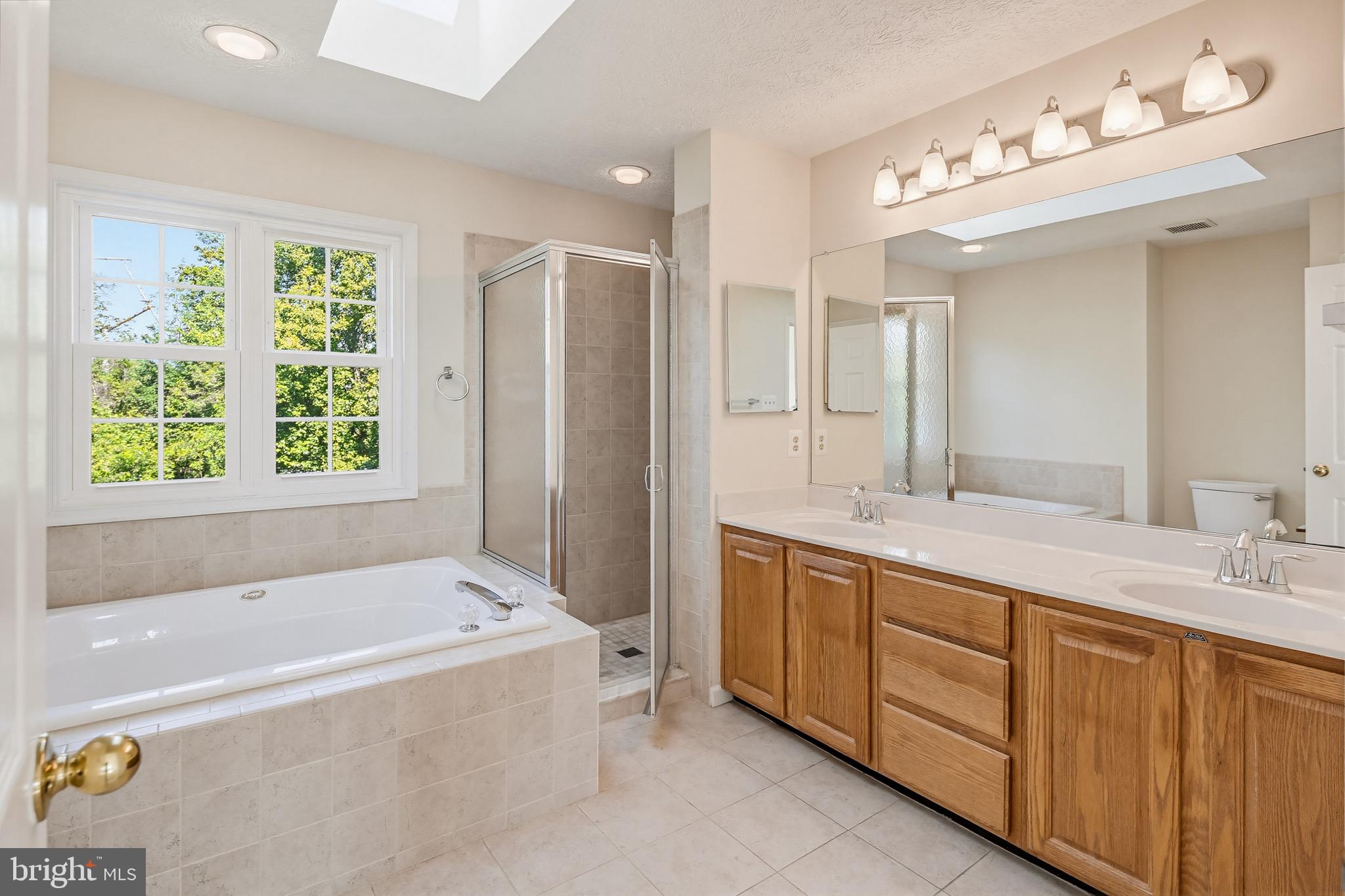 8266 Spring Branch Court Laurel, MD 20723 - Photo 35 of 73 Primary bathroom - soaking tub, tiled shower stall