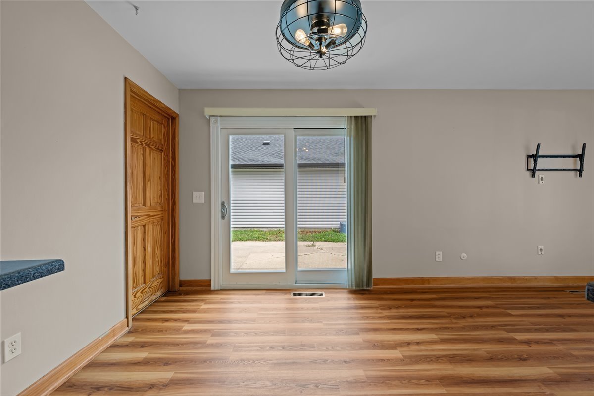 124 Heathgate Road Montgomery, IL 60538 - Photo 11 of 28 a view of an empty room with a window