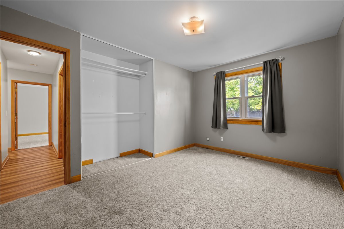 124 Heathgate Road Montgomery, IL 60538 - Photo 22 of 28 a view of an empty room with a window