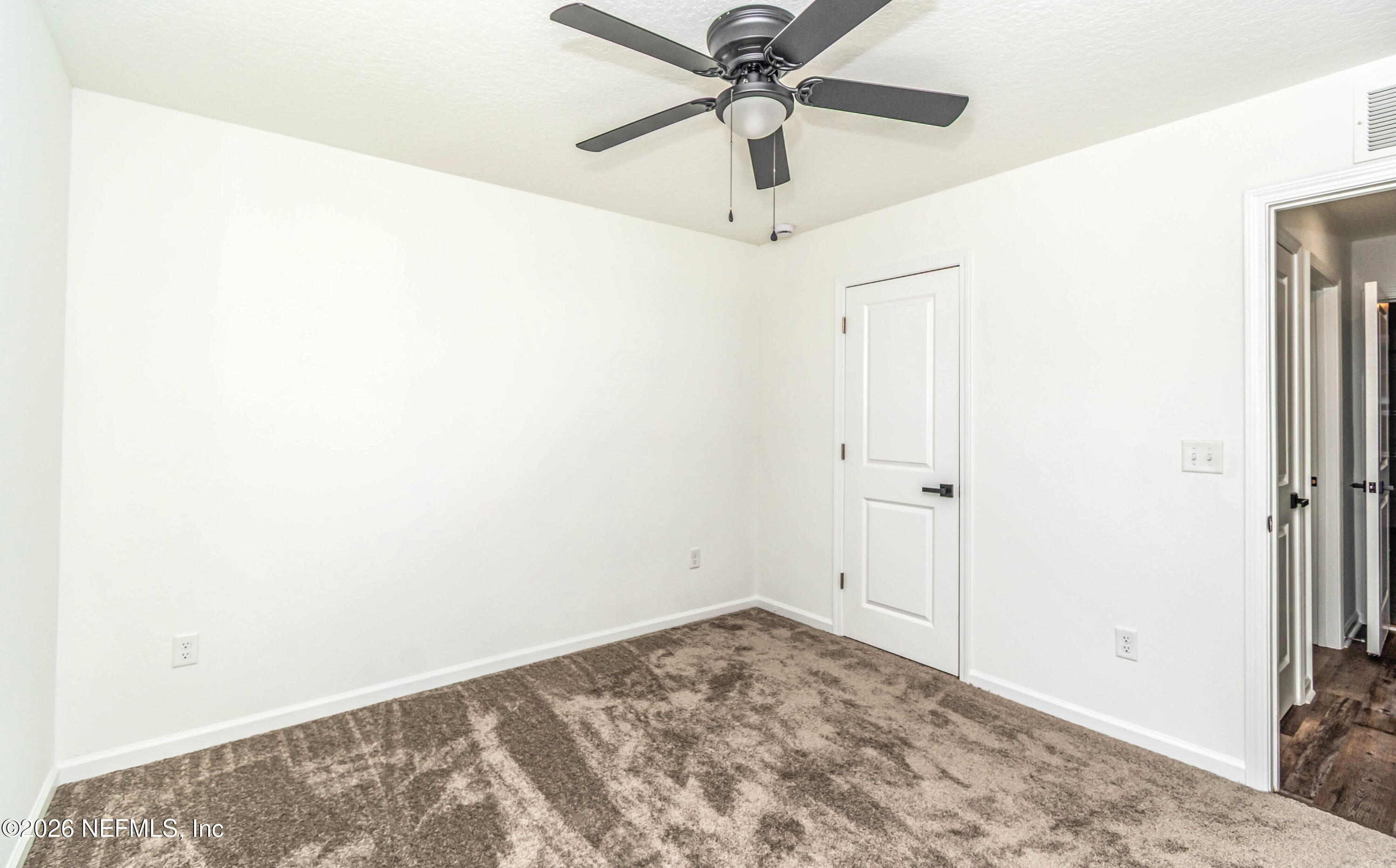 768 Constitution Place Macclenny, FL 32063 - Photo 19 of 41 a view of a room with a ceiling fan