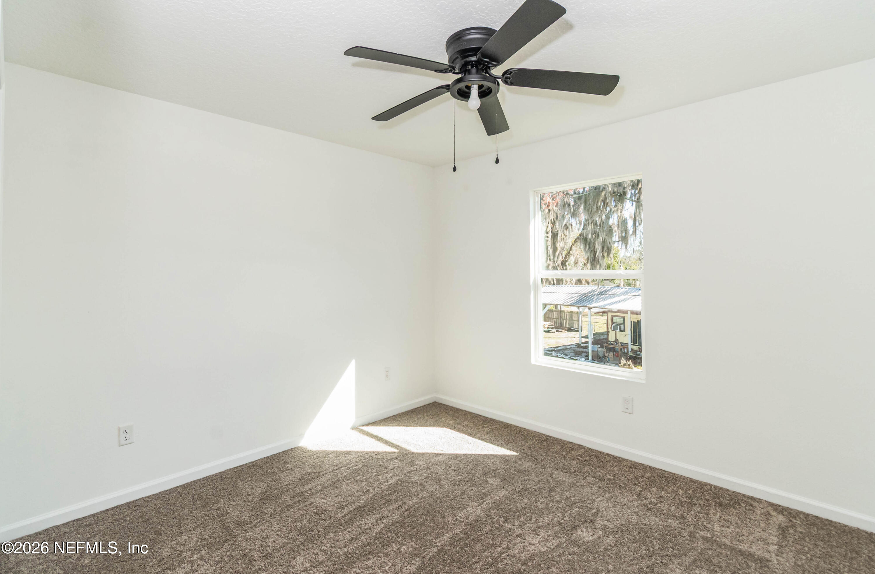 768 Constitution Place Macclenny, FL 32063 - Photo 22 of 41 a view of empty room with ceiling fan