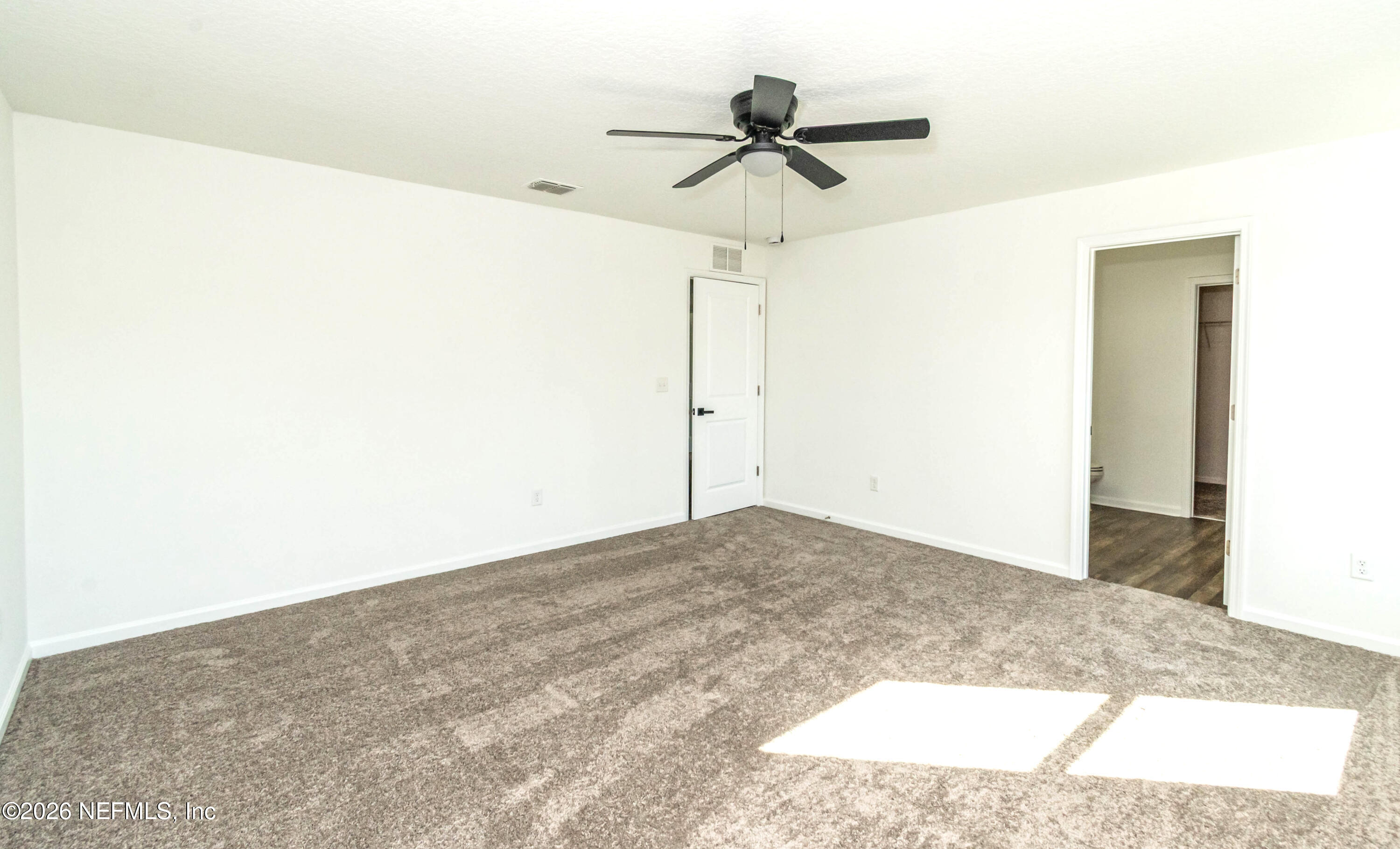768 Constitution Place Macclenny, FL 32063 - Photo 34 of 41 a view of a ceiling fan in a room