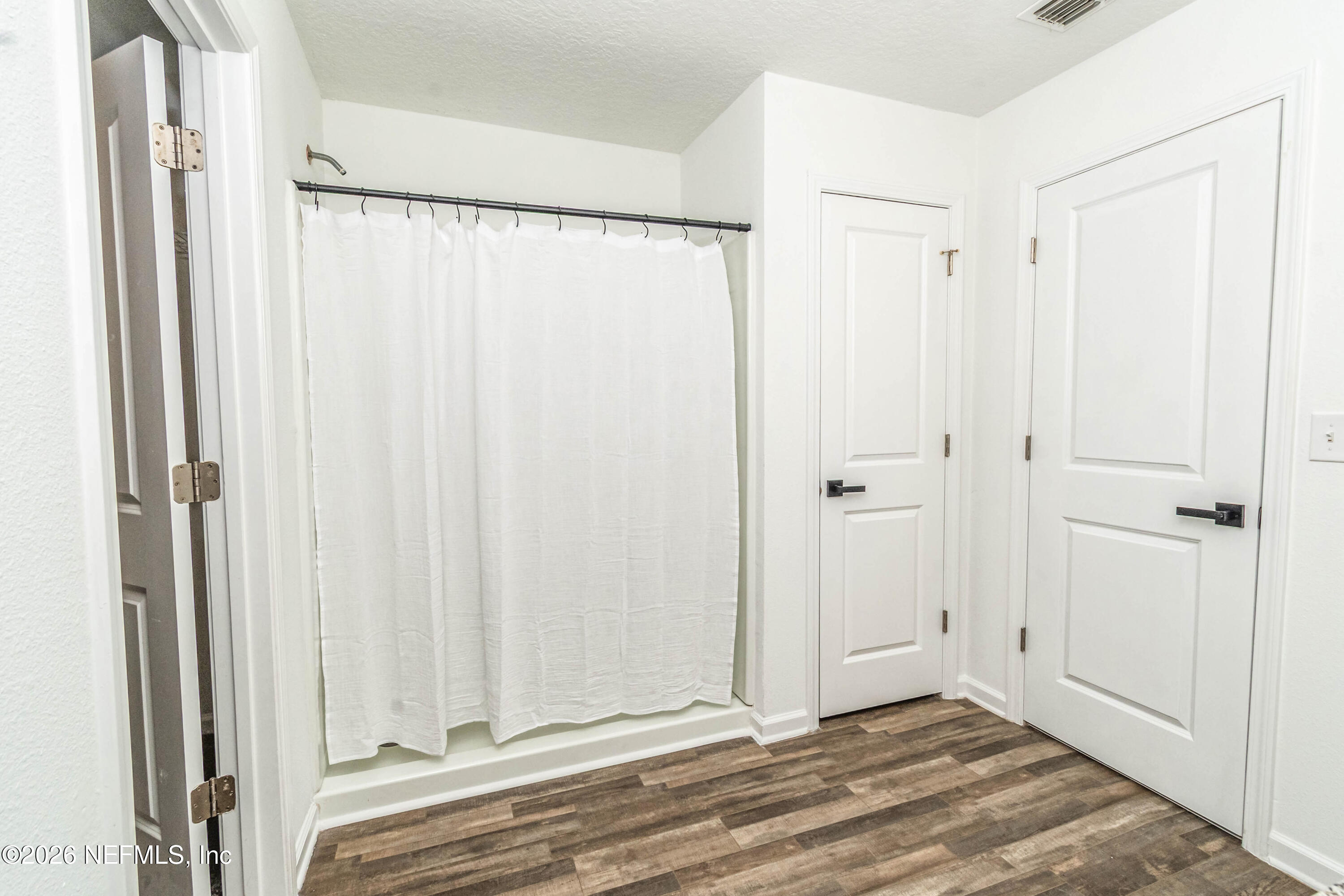 768 Constitution Place Macclenny, FL 32063 - Photo 37 of 41 a view of a bathroom with wooden floor