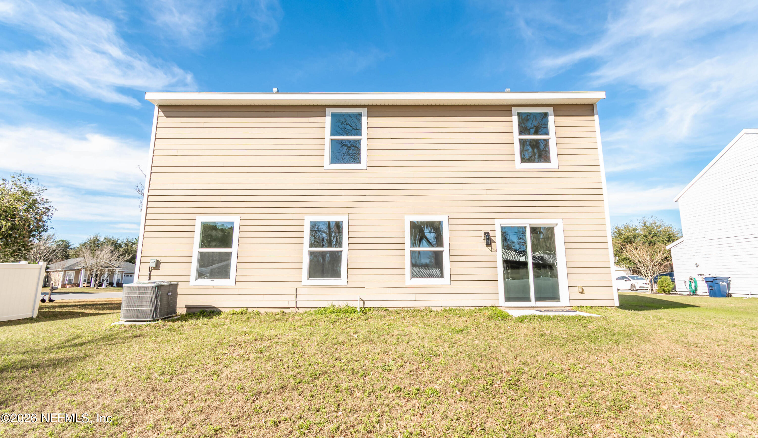 768 Constitution Place Macclenny, FL 32063 - Photo 40 of 41 a view of a house with a yard