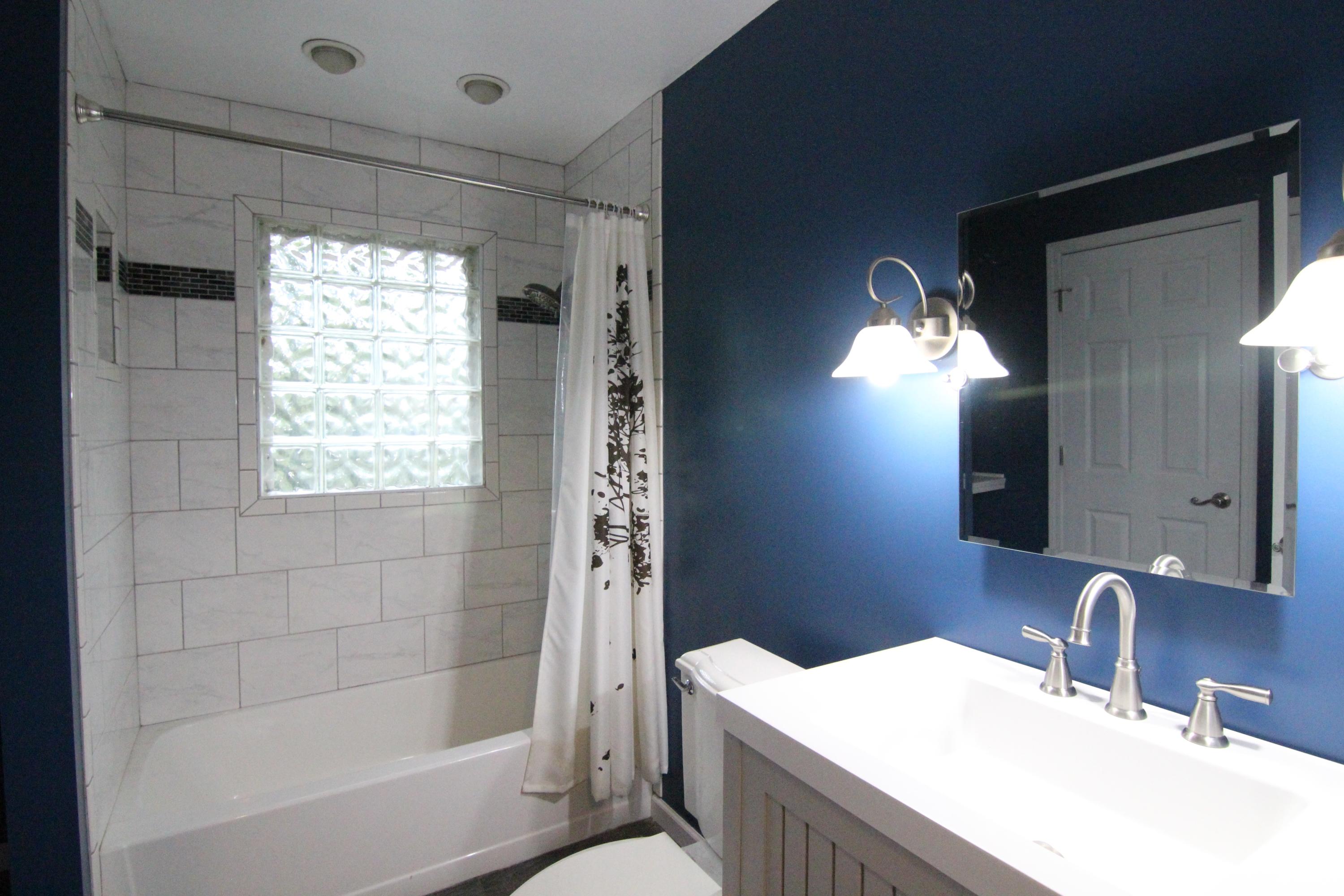 1100 Bandy Mill Road Hardy, VA 24101 - Photo 17 of 31 a bathroom with a sink a toilet and shower