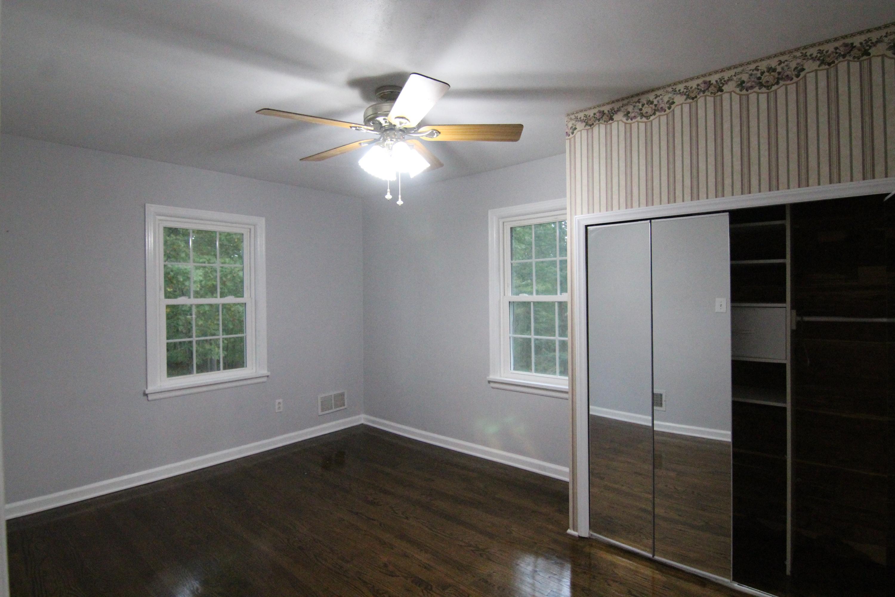 1100 Bandy Mill Road Hardy, VA 24101 - Photo 20 of 31 an empty room with wooden floor closet and windows