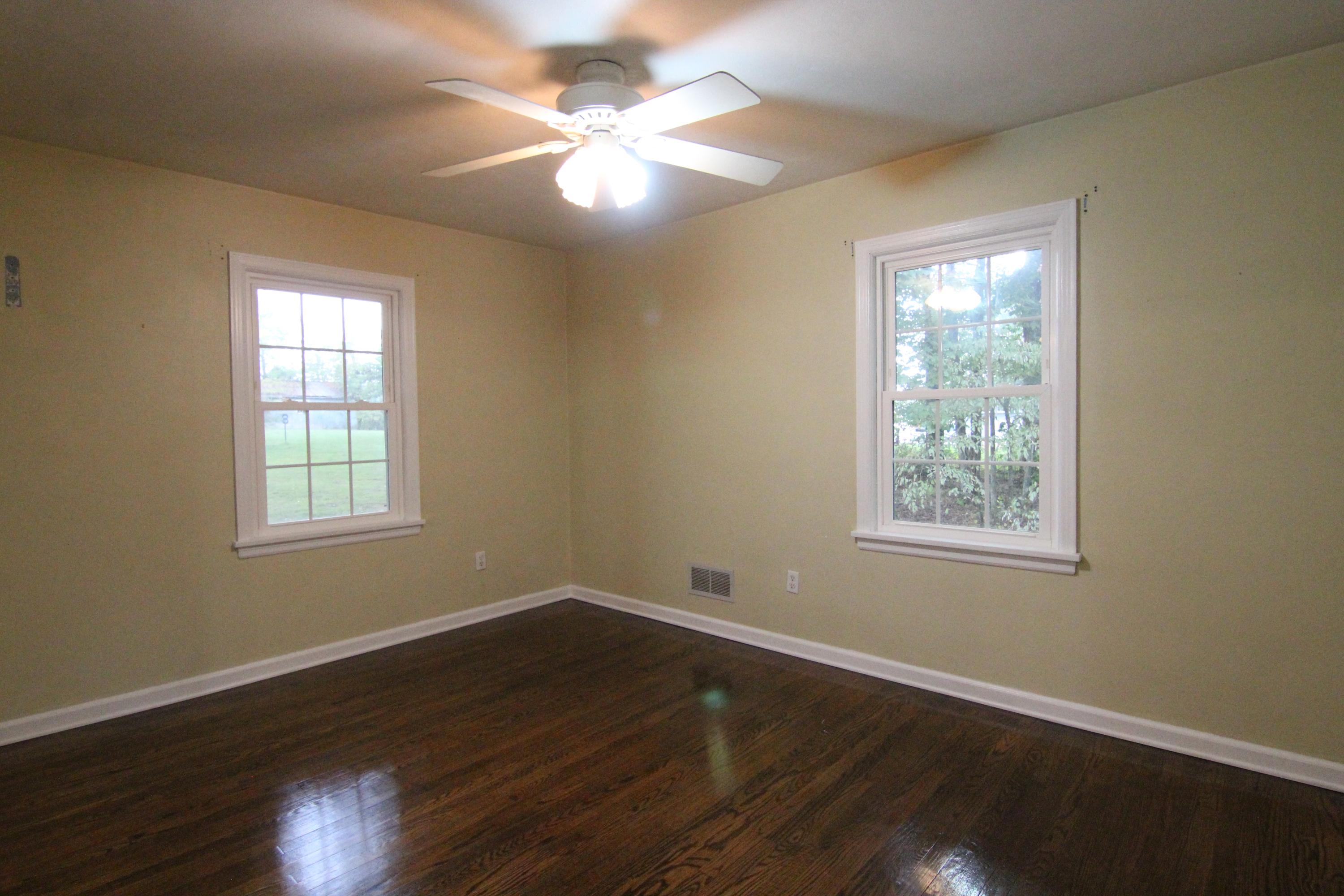1100 Bandy Mill Road Hardy, VA 24101 - Photo 23 of 31 a view of an empty room with wooden floor and a window