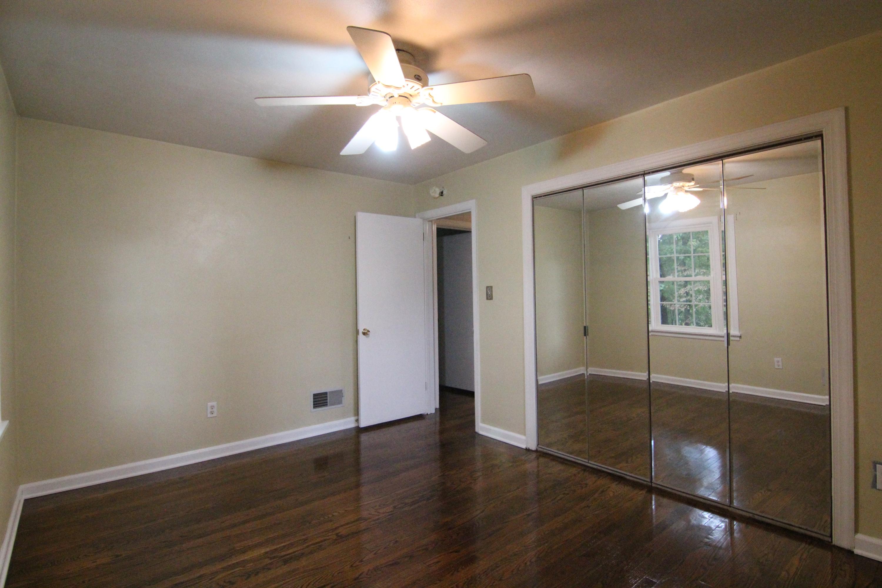 1100 Bandy Mill Road Hardy, VA 24101 - Photo 24 of 31 an empty room with wooden floor and fan
