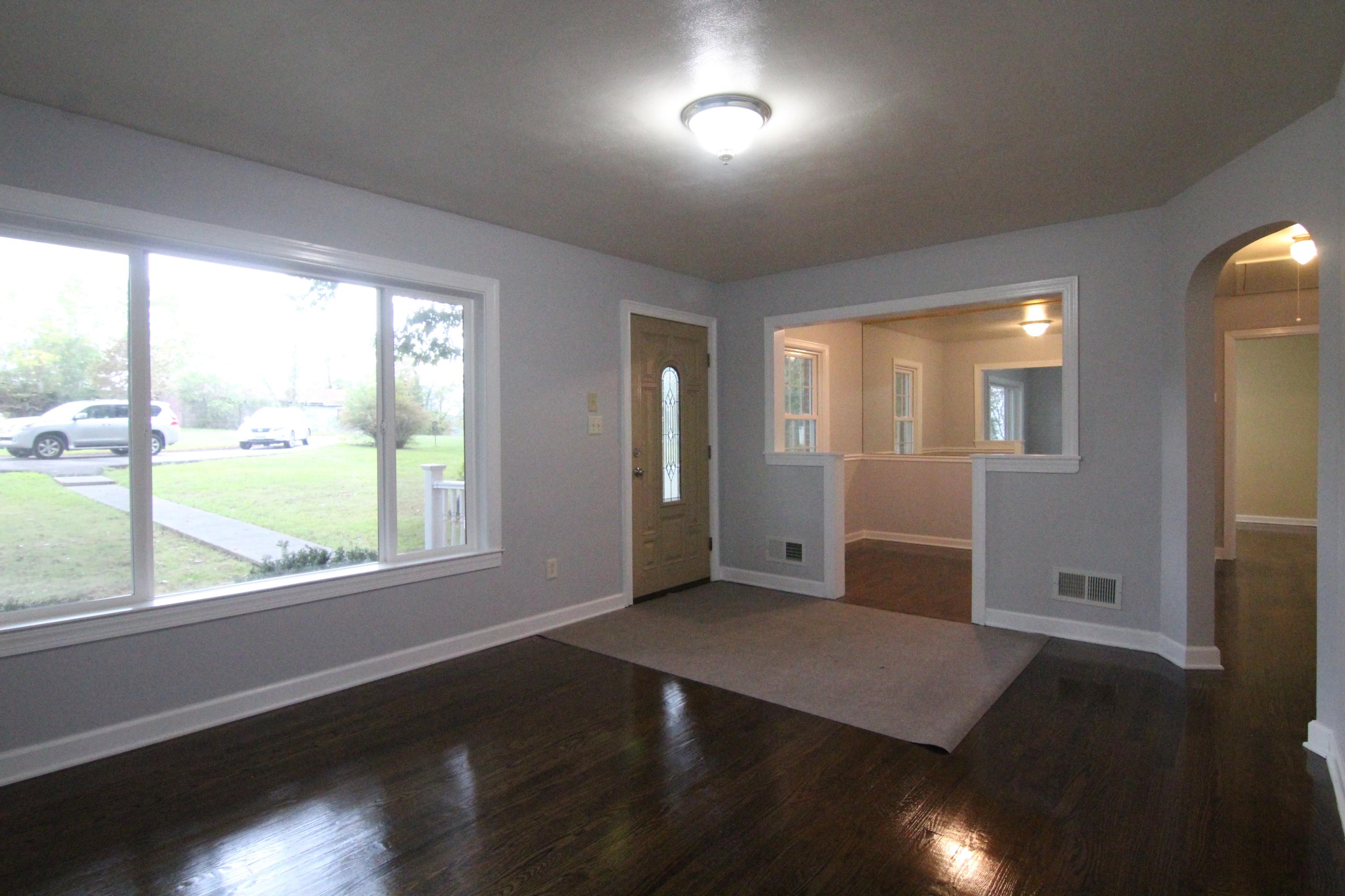 1100 Bandy Mill Road Hardy, VA 24101 - Photo 7 of 31 a view of an empty room with wooden floor and a window