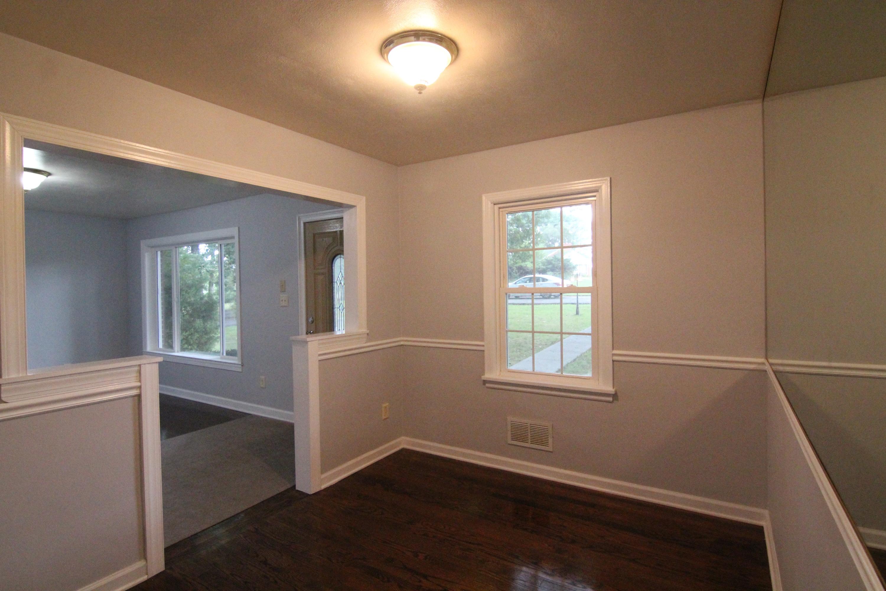 1100 Bandy Mill Road Hardy, VA 24101 - Photo 10 of 31 an empty room with wooden floor and windows