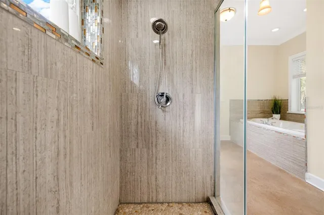 a kitchen that has a sink and a stove in it