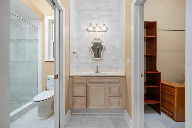 a outdoor space with furniture and a ceiling fan