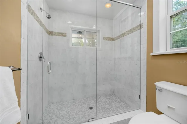 a building outdoor space with patio furniture and outdoor space