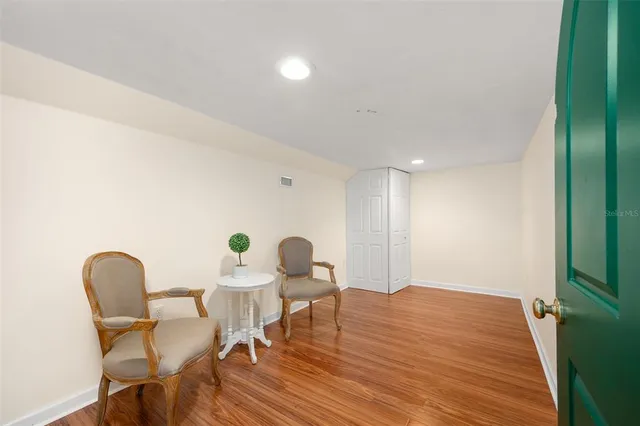 a view of a dining room with furniture window and outside view