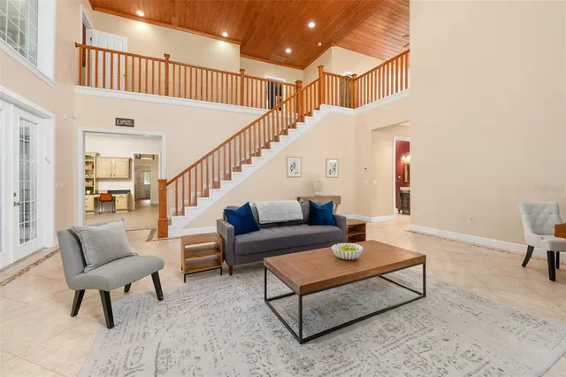a view of a livingroom with furniture and a fireplace