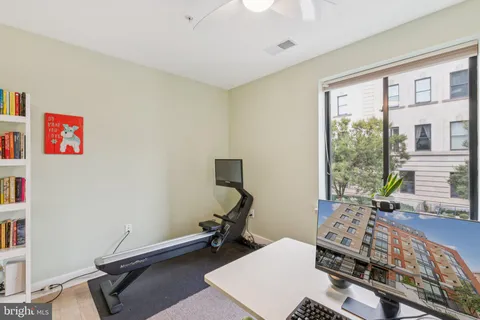 a room with furniture and a window