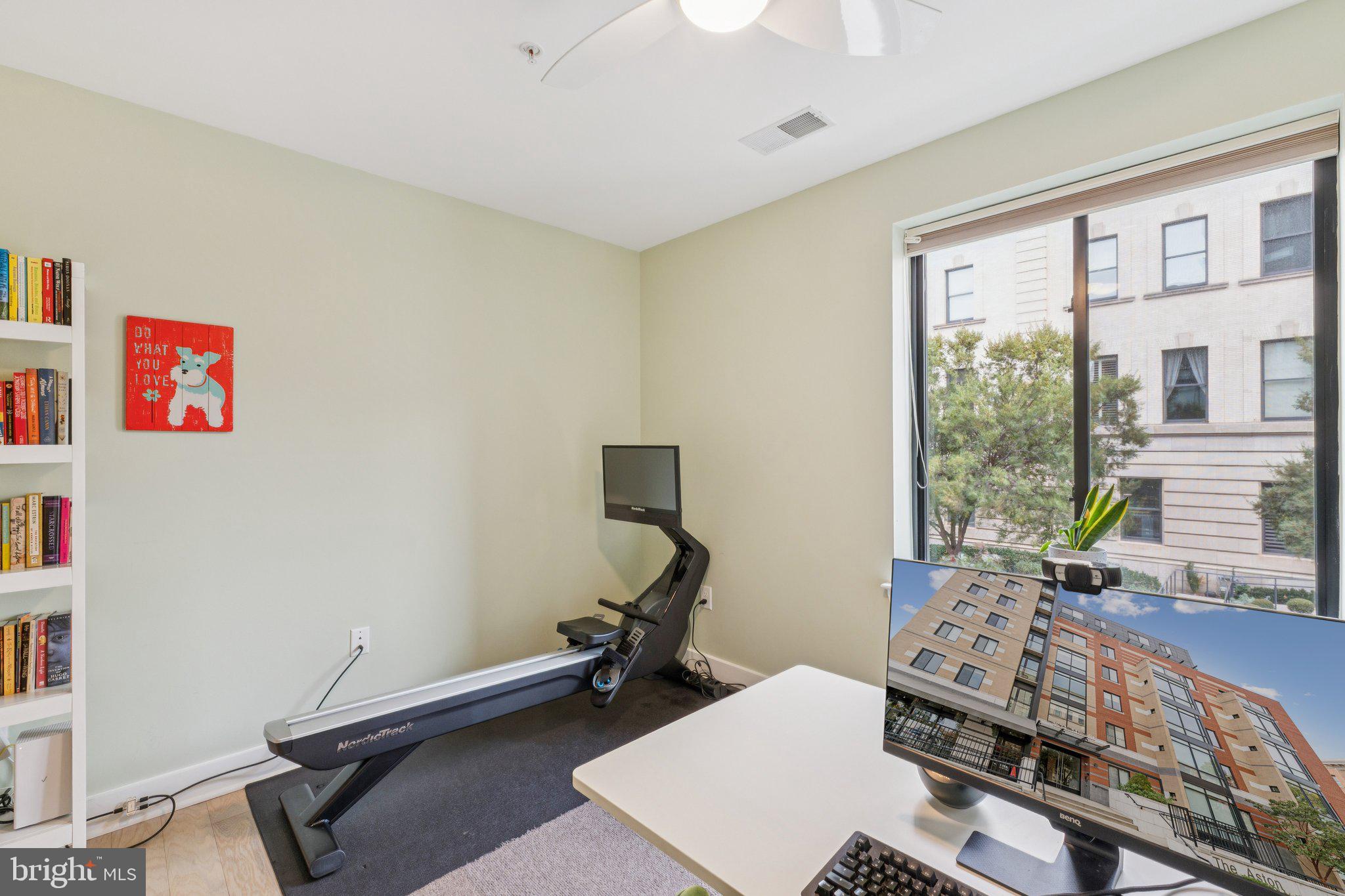 1634 14th Street Northwest, Unit 201 Washington, DC 20009 - Photo 15 of 21 a room with furniture and a window