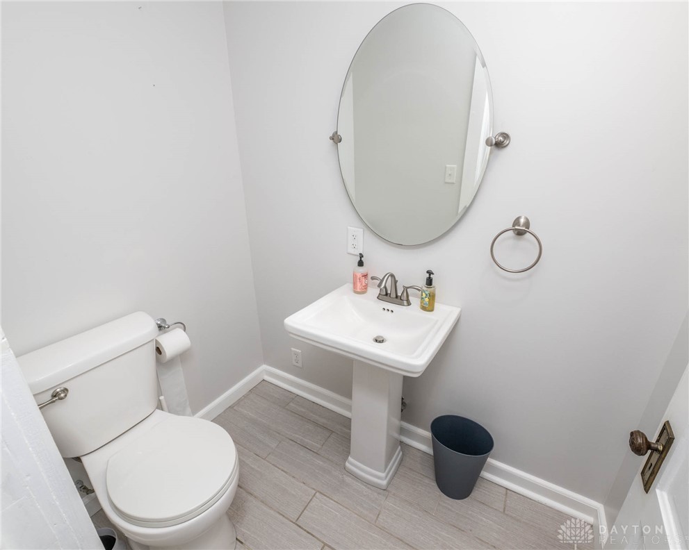 190 Swailes Road Troy, OH 45373 - Photo 13 of 82 This bright bathroom features sleek flooring and a contemporary pedestal sink.