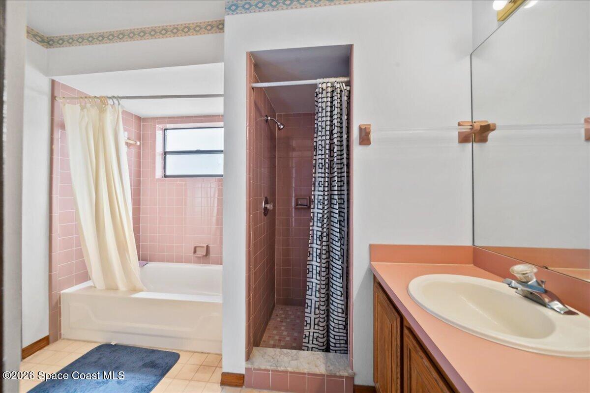 846 Gardener Road Rockledge, FL 32955 - Photo 19 of 27 a bathroom with a sink and a bathtub