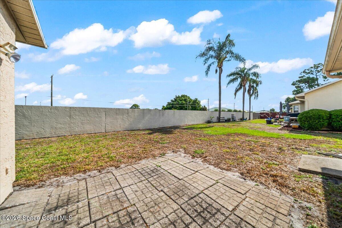 846 Gardener Road Rockledge, FL 32955 - Photo 23 of 27 a view of a swimming pool and an outdoor space