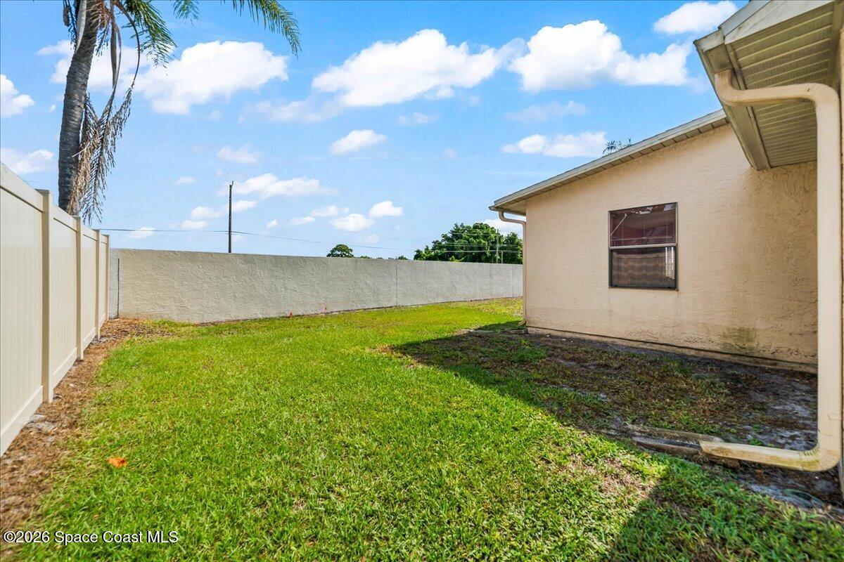 846 Gardener Road Rockledge, FL 32955 - Photo 24 of 27 a view of back yard of the house