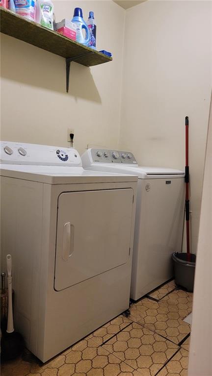 234 Howell Terrace Southwest Atlanta, GA 30331 - Photo 19 of 64 a utility room with dryer and washer