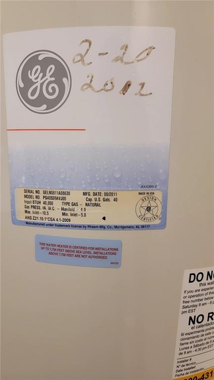 234 Howell Terrace Southwest Atlanta, GA 30331 - Photo 21 of 64 a view of a hallway with wooden cabinet