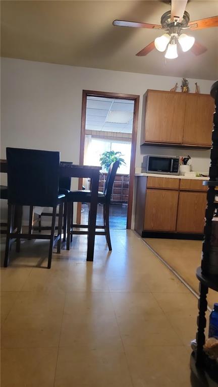 234 Howell Terrace Southwest Atlanta, GA 30331 - Photo 32 of 64 a view of a dining room with furniture and chandelier