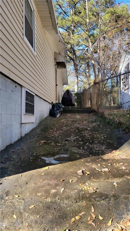 234 Howell Terrace Southwest Atlanta, GA 30331 - Photo 61 of 64 a view of a house with a yard